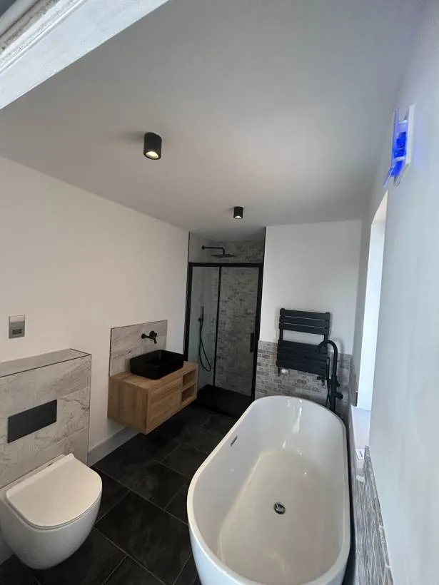 Bathroom with black downlights, new build home at Graven Hill, Bicester