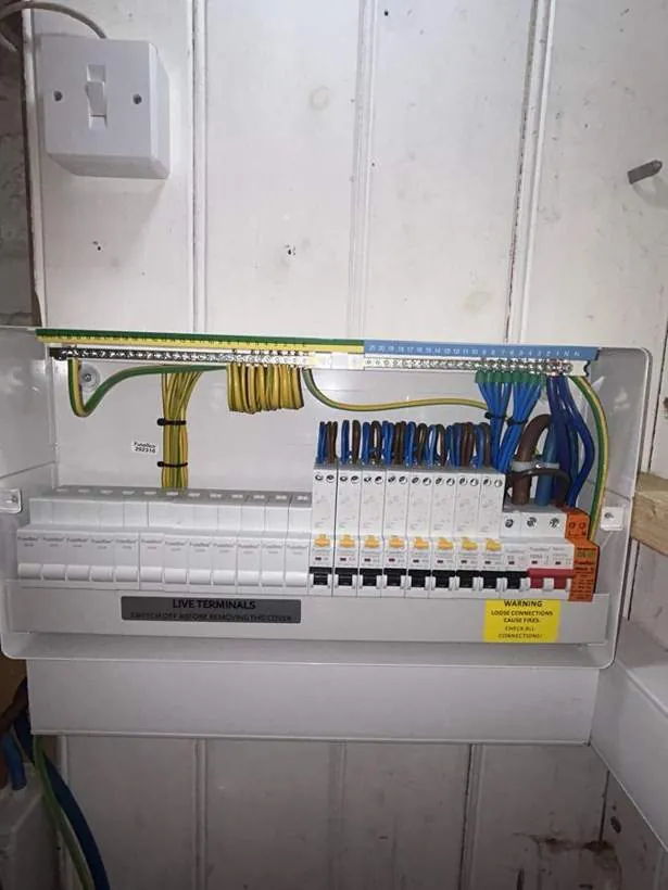 New consumer unit with RCBO protection and neatly dressed wiring after relocation to an under-stair cupboard, Summertown, Oxford