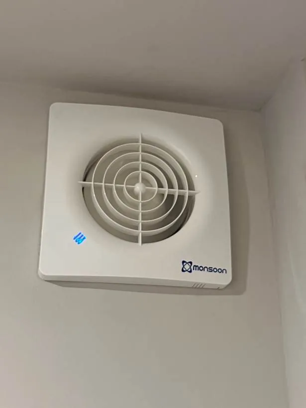 New bathroom extractor fan fitted to a ceiling, Brackley