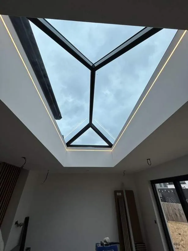 Recessed LED strip lighting outlining a roof lantern in a new kitchen extension, Graven Hill, Bicester