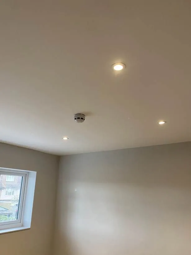 HMO room ceiling with recessed downlights and a fire alarm detector, Feltham