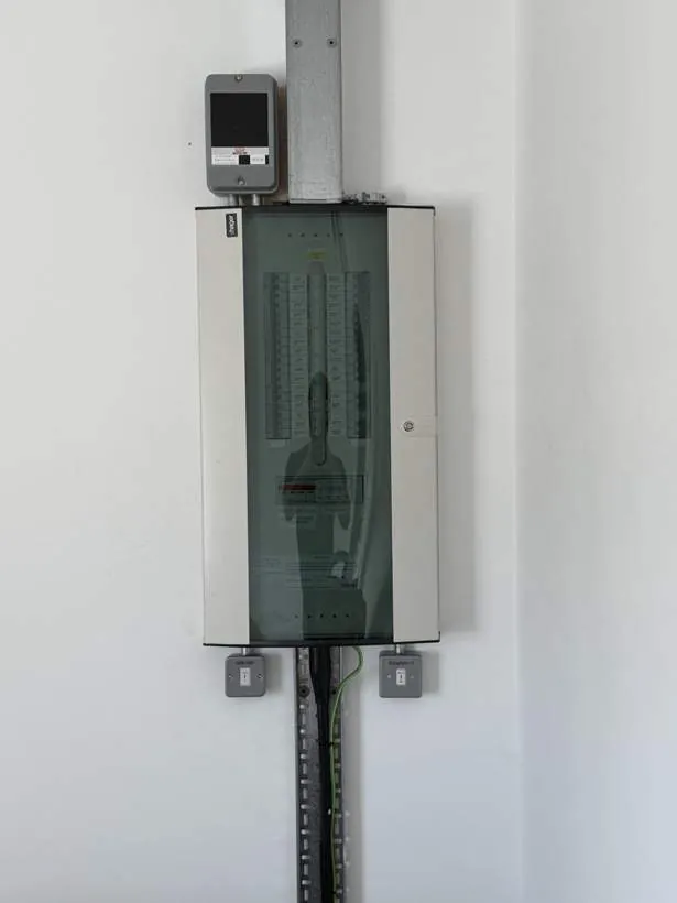Neatly installed commercial distribution board with trunking above and below, Bicester