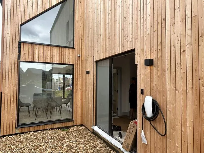 Timber-clad new build home with an EV charger, outside lights, video doorbell and CCTV installed, Graven Hill, Bicester