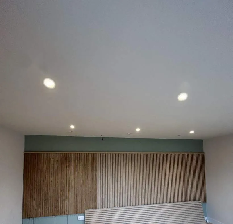 Converted garage with new LED downlights, feature slatted wall and herringbone floor, Watlington, Oxfordshire