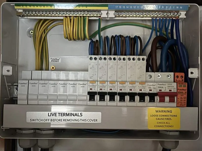 New consumer unit with RCBO protection and neatly terminated circuits, installed as part of a full rewire in Oxford